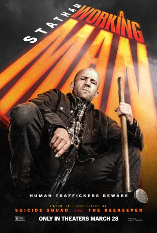 Movie Poster for A Working Man. The movie title is in large letters in the background, and the main character is looking down at the camera in a crouched position