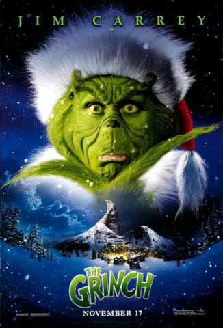 over a dark background, a right green character is dressed in a Santa suit, overlooking a fantasy village and curvy mountain